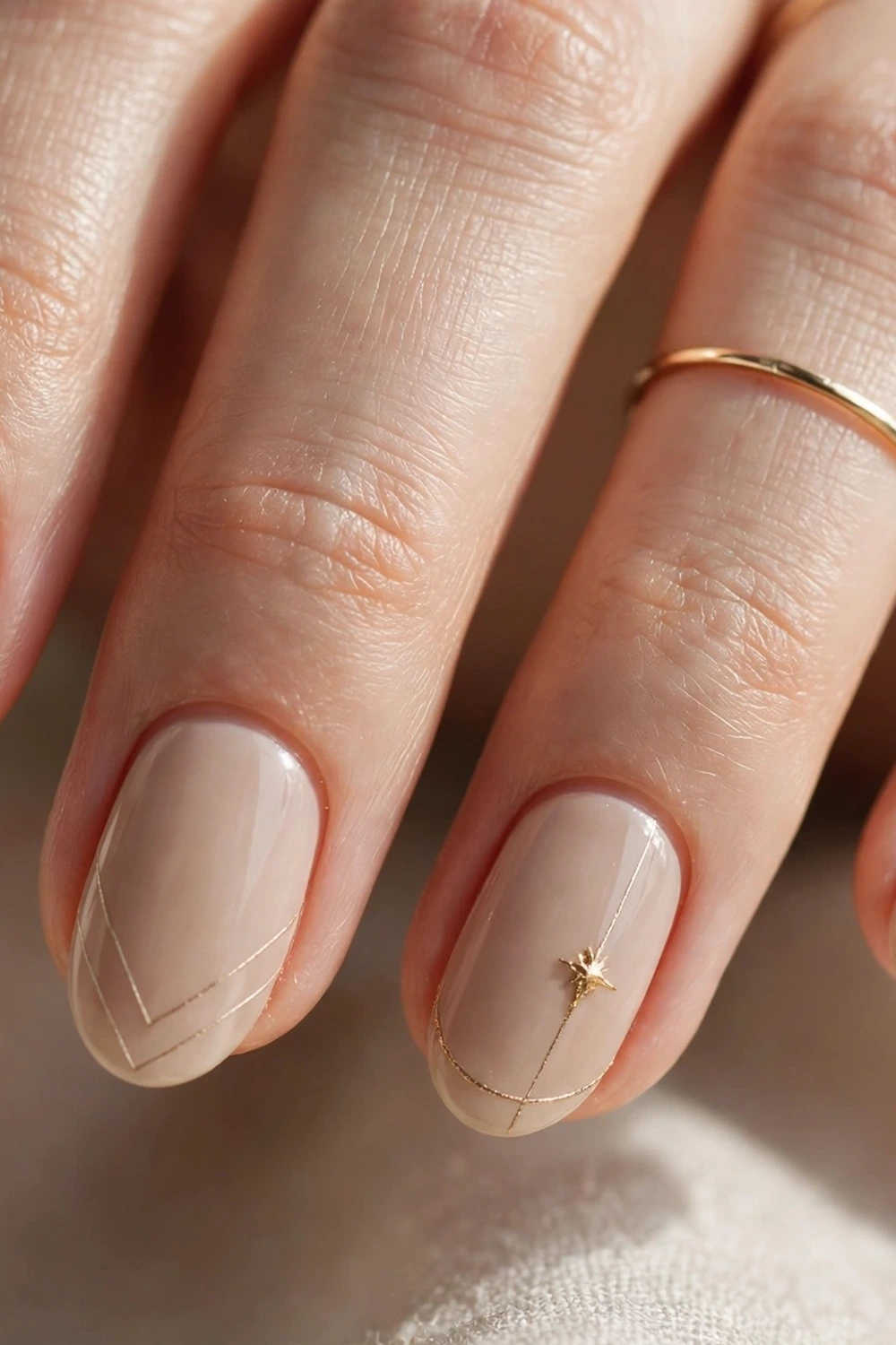 Nude and gold minimal elegant new year nail ideas